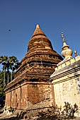 Bagan Myanmar. Next to the Gubyaukgyi stands the gilded Myazedi or 'Emerald Stupa'. 